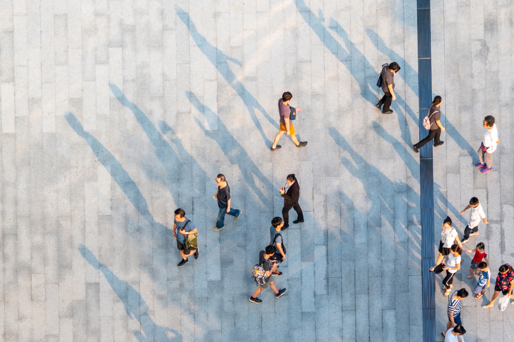 birdseye view of people walking in a city